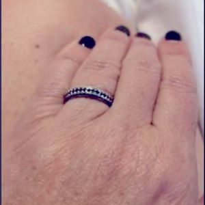 Wedding band brand new. Black and white diamonds. Have the receipt and paperwork